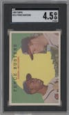 Hank Aaron/Eddie Mathews from the 1959 Topps set graded by SGC and given an overall grade of 4.5.