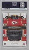 Patrick Mahomes II from the 2023 Panini Select set featuring a Dragon Scale parallel graded by PSA and given an overall grade of 9.