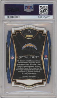 Justin Herbert from the 2020 Panini Select set featuring a Die-Cut Purple parallel graded by PSA and given an overall grade of 8.