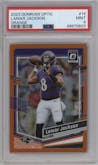 Lamar Jackson from the 2023 Donruss Optic set featuring a Orange parallel graded by PSA and given an overall grade of 9.