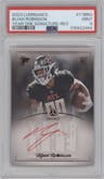 Bijan Robinson from the 2023 Panini Luminance set featuring a Red parallel graded by PSA and given an overall grade of 9.