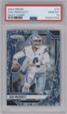 Dak Prescott from the 2024 Panini Prizm set featuring a Navy Camo parallel graded by PSA and given an overall grade of 10.
