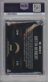 Justin Herbert from the 2021 Panini Illusions set graded by PSA and given an overall grade of 9.