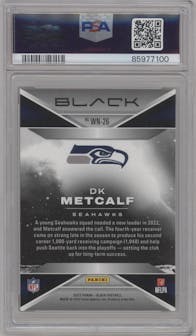 DK Metcalf from the 2023 Panini Black set graded by PSA and given an overall grade of 10.