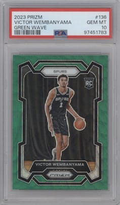 Victor Wembanyama from the 2023-24 Panini Prizm set featuring a Green Wave parallel graded by PSA and given an overall grade of 10.