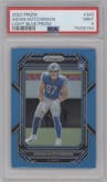 Aidan Hutchinson from the 2022 Panini Prizm set featuring a Light Blue Prizm parallel graded by PSA and given an overall grade of 9.