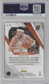 Devin Booker from the 2023-24 Panini Phoenix set featuring a Fire and Ice parallel graded by PSA and given an overall grade of 10.