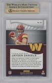 Jayden Daniels from the 2024 Panini Illusions set featuring a Retail parallel graded by Beckett and given an overall grade of 9.5.