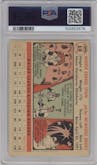 Warren Spahn from the 1956 Topps set featuring a White Back parallel graded by PSA and given an overall grade of 2.5.
