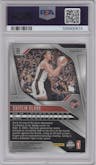 Caitlin Clark from the 2024 Panini Prizm WNBA set featuring a Pink Velocity parallel graded by PSA and given an overall grade of 8.