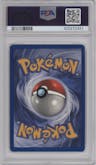 Machamp from the 1999 Pokemon set graded by PSA and given an overall grade of 8.