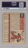 Tom Carroll from the 1959 Topps set graded by PSA and given an overall grade of 7.