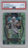 Tua Tagovailoa from the 2022 Panini Select set featuring a Dragon Scale parallel graded by PSA and given an overall grade of 10.