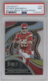 Patrick Mahomes II from the 2023 Panini Select set featuring a Die-Cut Red/Yellow Prizm parallel graded by PSA and given an overall grade of 9.