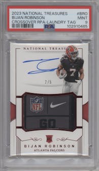 Bijan Robinson from the 2023 Panini National Treasures set featuring a Laundry Tag parallel graded by PSA and given an overall grade of 9.