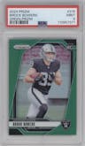Brock Bowers from the 2024 Panini Prizm set featuring a Green Prizm parallel graded by PSA and given an overall grade of 9.