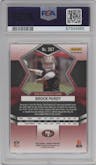 Brock Purdy from the 2022 Panini Mosaic set featuring a Reactive Orange parallel graded by PSA and given an overall grade of 10.