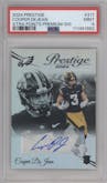 Cooper DeJean from the 2024 Panini Prestige  set graded by PSA and given an overall grade of 9.