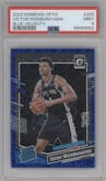 Victor Wembanyama from the 2023-24 Donruss Optic set featuring a Blue Velocity parallel graded by PSA and given an overall grade of 9.