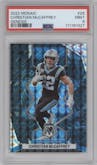 Christian McCaffrey from the 2022 Panini Mosaic set featuring a Genesis parallel graded by PSA and given an overall grade of 9.