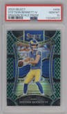 Stetson Bennett IV from the 2023 Panini Select set featuring a Dragon Scale parallel graded by PSA and given an overall grade of 10.