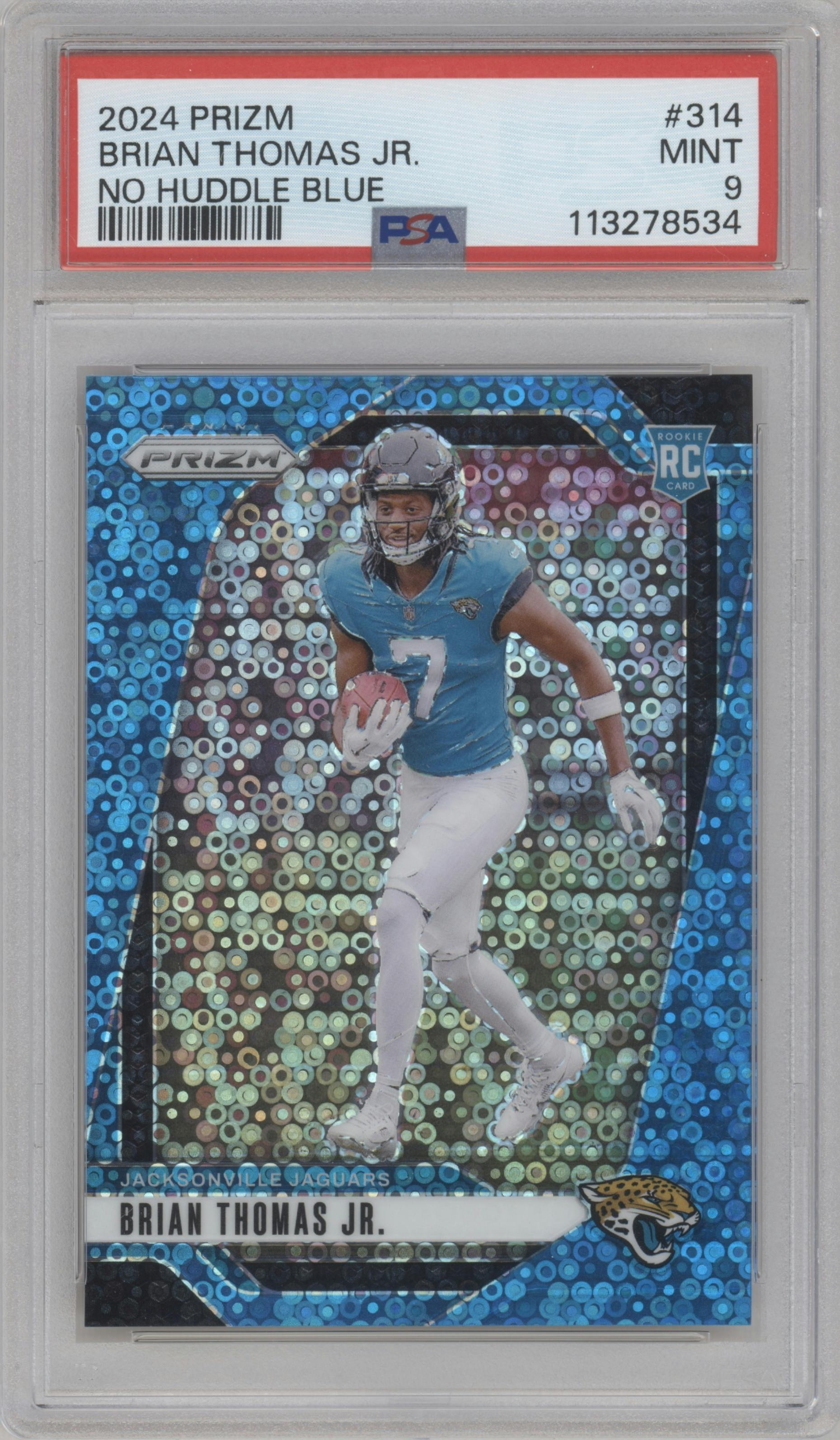 Brian Thomas Jr. from the 2024 Panini Prizm set featuring a No Huddle Blue Prizm parallel graded by PSA and given an overall grade of 9.