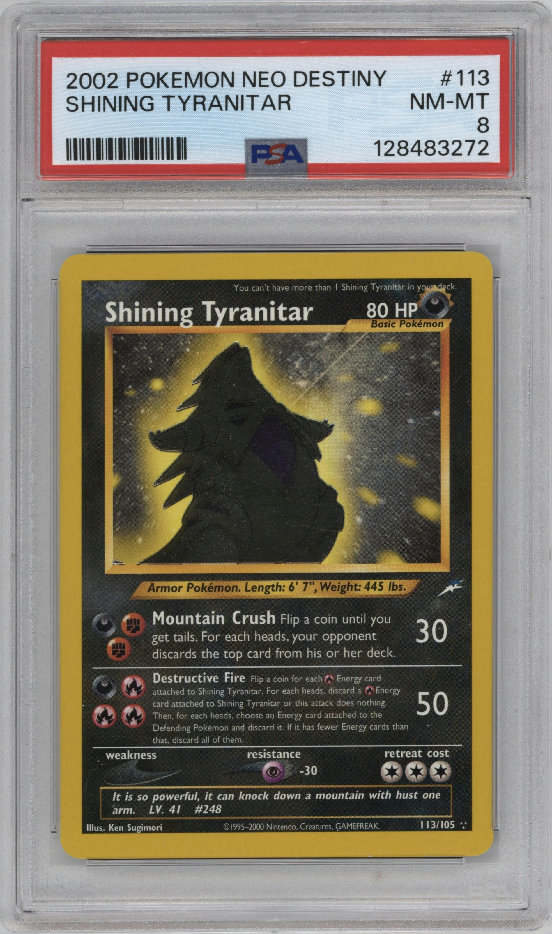 Shining Tyranitar from the 2002 Pokemon Neo Genesis set graded by PSA and given an overall grade of 8.