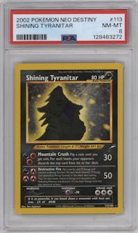 Shining Tyranitar from the 2002 Pokemon Neo Genesis set graded by PSA and given an overall grade of 8.