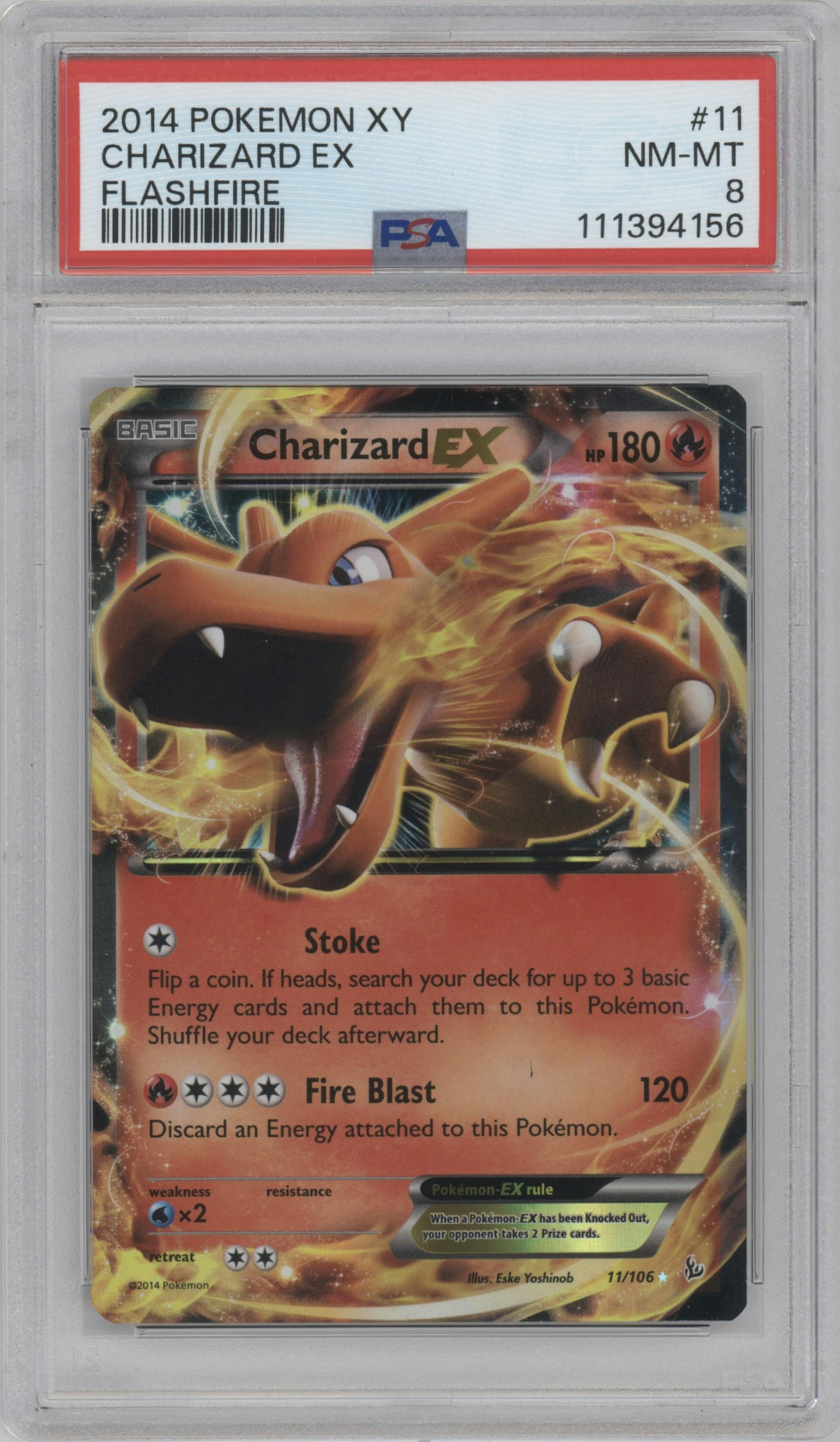 Charizard EX from the 2014 Pokemon XY set graded by PSA and given an overall grade of 8.