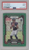 C.J. Stroud from the 2023 Panini Prizm set featuring a Green Wave  parallel graded by PSA and given an overall grade of 9.