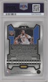 Jalen Brunson from the 2023-24 Panini Prizm set featuring a Red Sparkle parallel graded by PSA and given an overall grade of 10.
