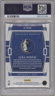 Luka Doncic from the 2022-23 Panini National Treasures set featuring a Gold parallel graded by PSA and given an overall grade of 9.