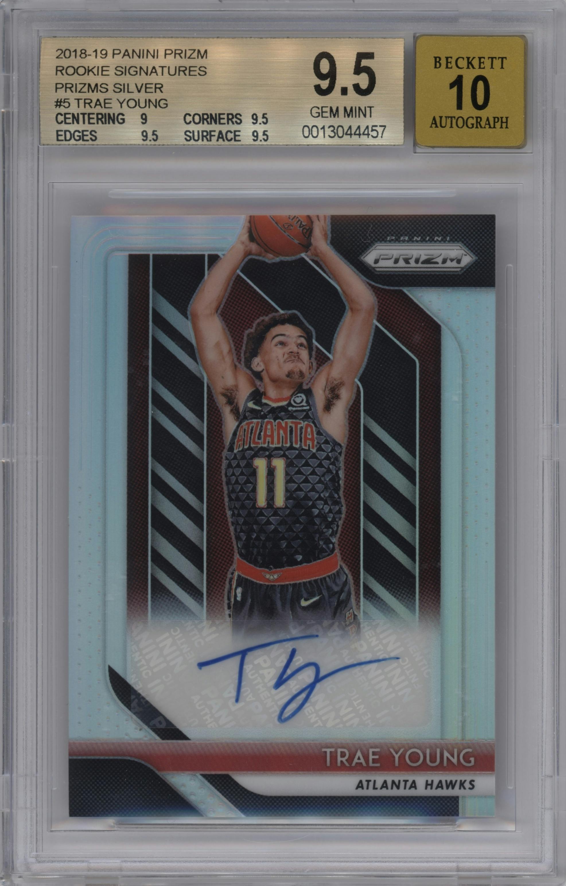 Trae Young from the 2018-19 Panini Prizm set featuring a Silver Prizm parallel graded by Beckett and given an overall grade of 9.5.