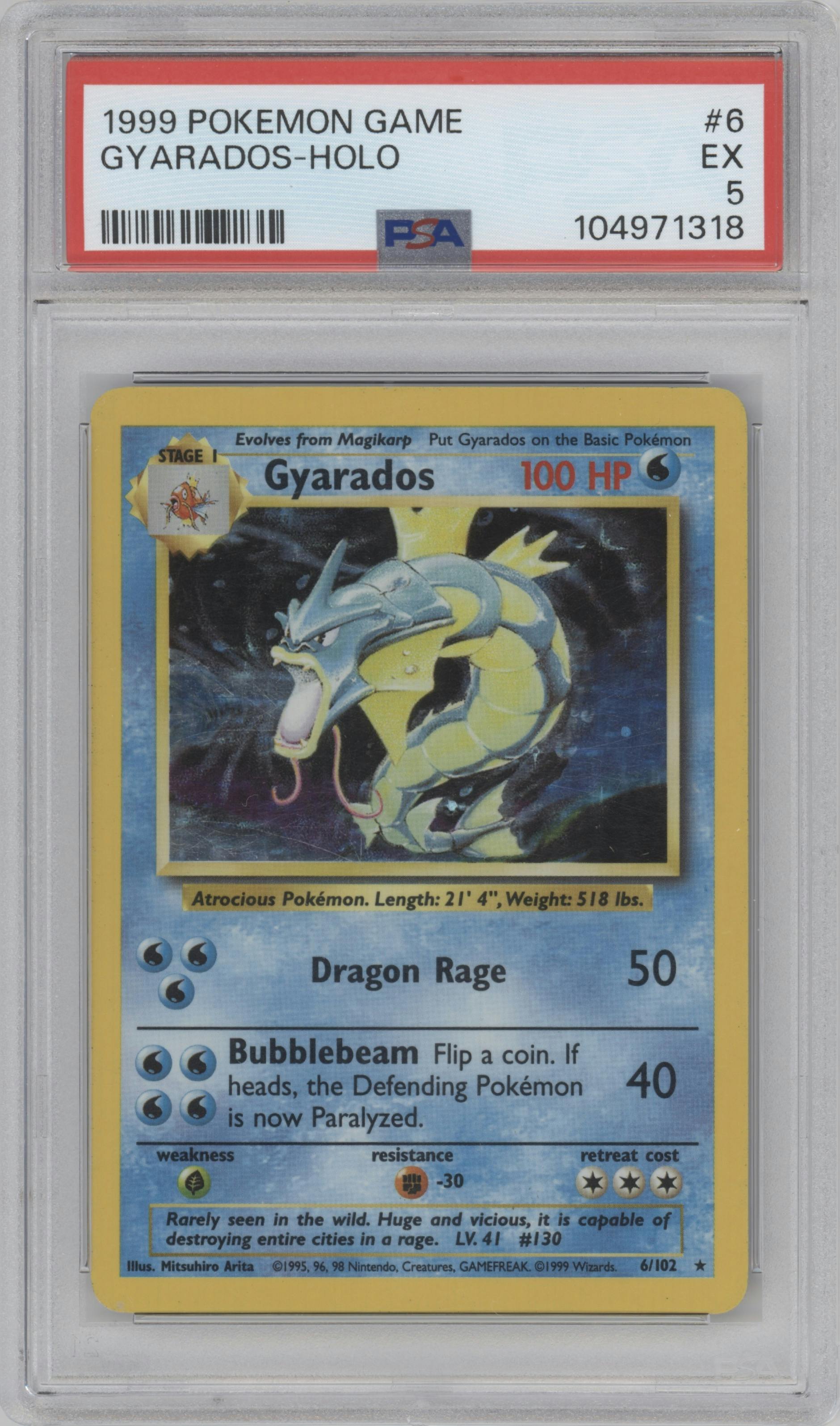 Gyarados from the 1999 Pokemon set graded by PSA and given an overall grade of 5.