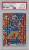 Justin Herbert from the 2020 Panini Mosaic set featuring a Reactive Orange parallel graded by PSA and given an overall grade of 10.