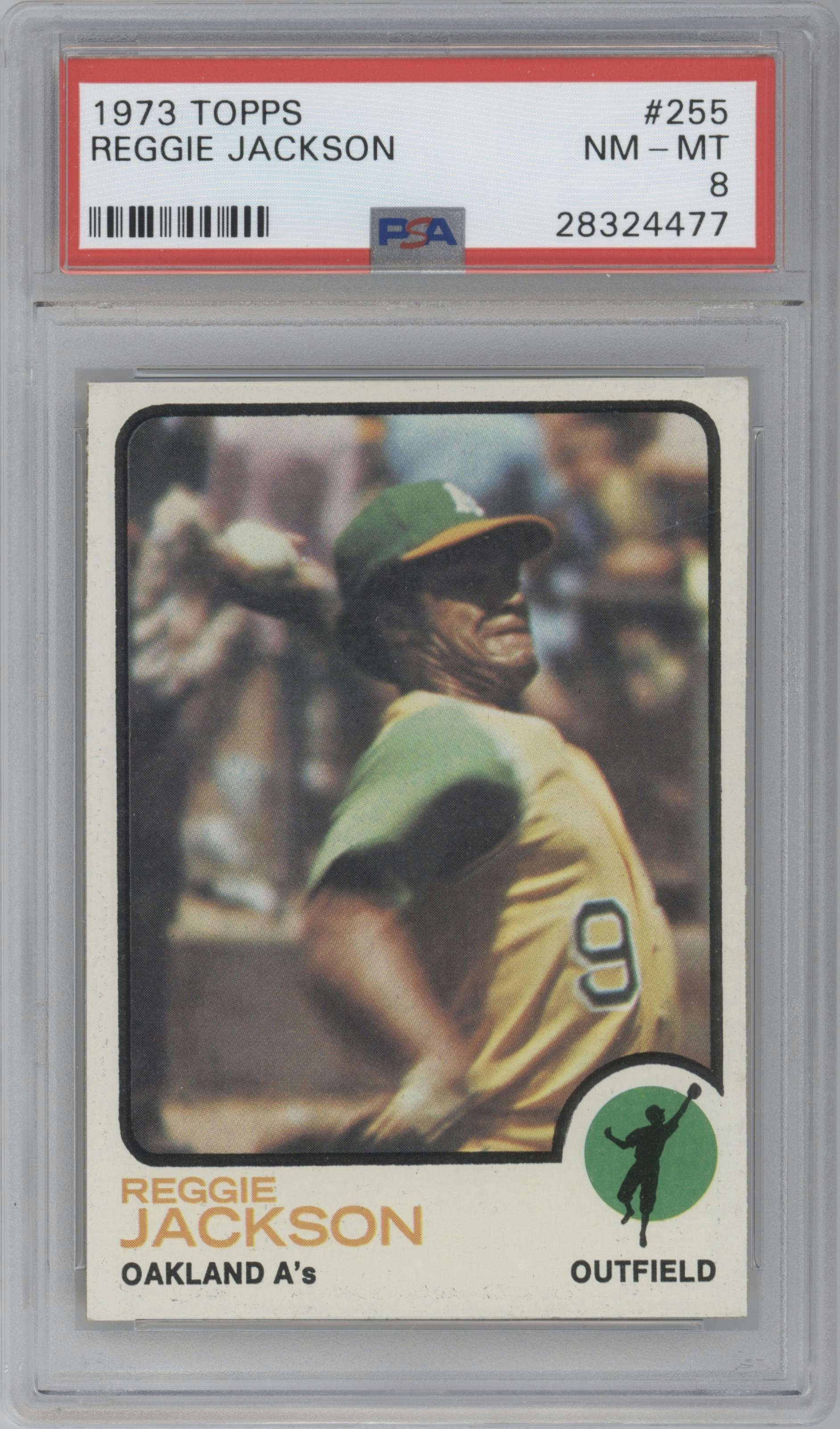 Reggie Jackson from the 1973 Topps set graded by PSA and given an overall grade of 8.