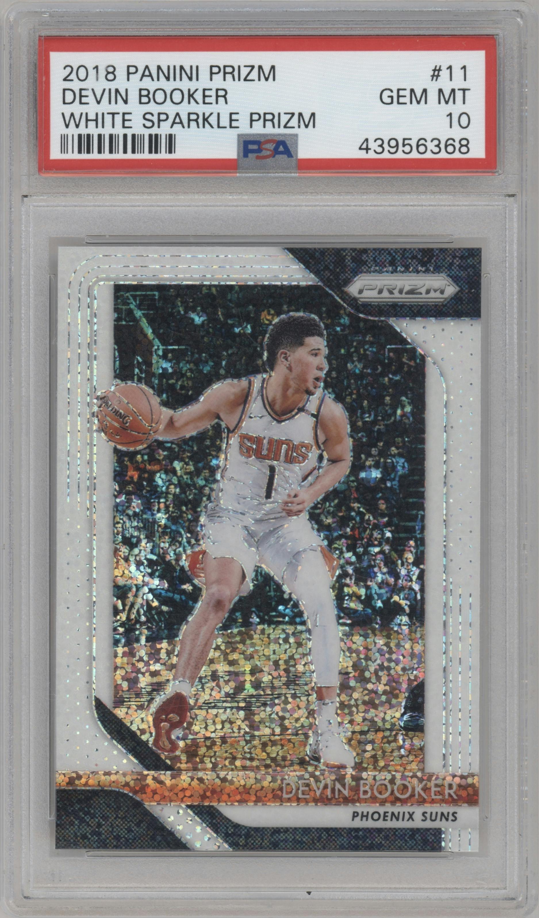 Devin Booker from the 2018-19 Panini Prizm set featuring a White Sparkle Prizm parallel graded by PSA and given an overall grade of 10.