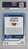 Jayden Daniels from the 2024 Donruss set featuring a Red Pandora parallel graded by PSA and given an overall grade of 9.