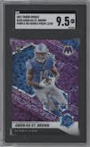 Amon-Ra St. Brown from the 2021 Panini Mosaic set featuring a No Huddle Purple parallel graded by SGC and given an overall grade of 9.5.
