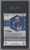 Amon-Ra St. Brown from the 2021 Panini Mosaic set featuring a No Huddle Purple parallel graded by SGC and given an overall grade of 9.5.