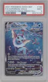 Vaporeon VMAX from the 2021 Pokemon SWSH set featuring a Vaporeon VMAX Premium Collection parallel graded by PSA and given an overall grade of 9.
