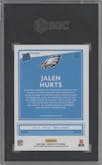 Jalen Hurts from the 2020 Panini Donruss Optic set featuring a Red Mojo parallel graded by SGC and given an overall grade of 9.5.