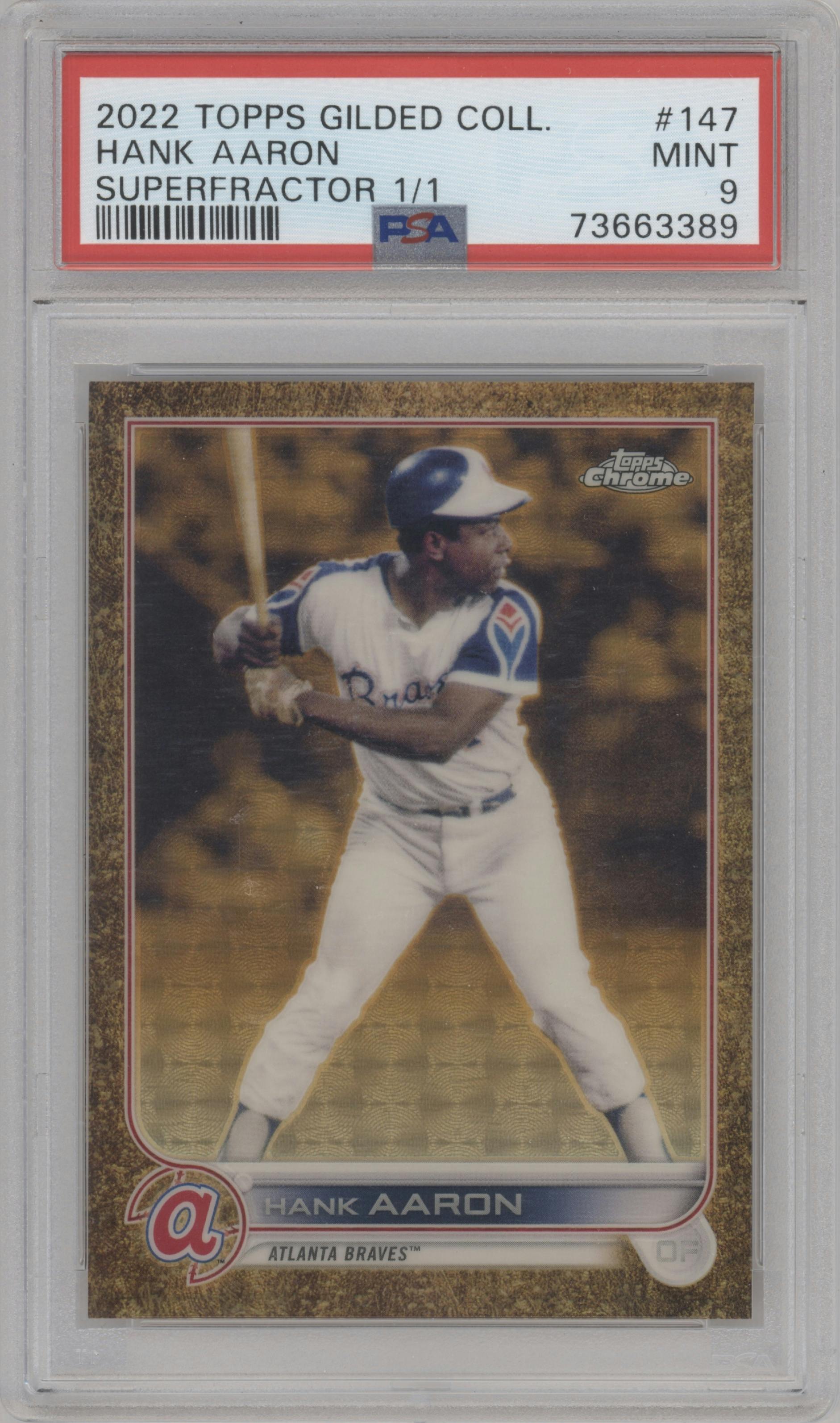 Hank Aaron from the 2022 Topps Gilded Collection set featuring a SuperFractor parallel graded by PSA and given an overall grade of 9.