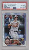 Adley Rutschman from the 2023 Topps Chrome set featuring a Prism Refractor parallel graded by PSA and given an overall grade of 10.