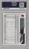 Adley Rutschman from the 2023 Topps Chrome set featuring a Prism Refractor parallel graded by PSA and given an overall grade of 10.