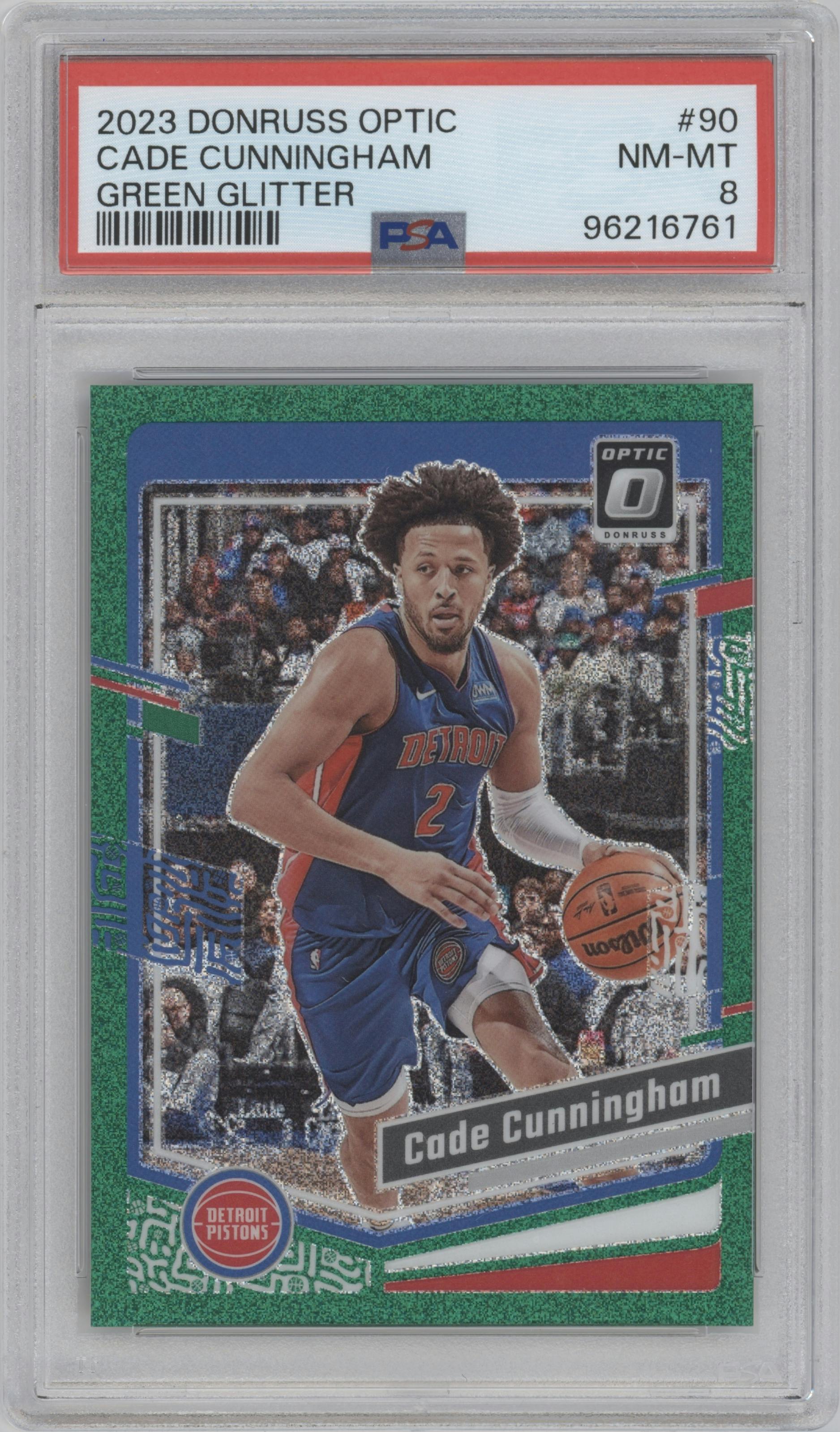 Cade Cunningham from the 2023-24 Donruss Optic set featuring a Green Glitter parallel graded by PSA and given an overall grade of 8.