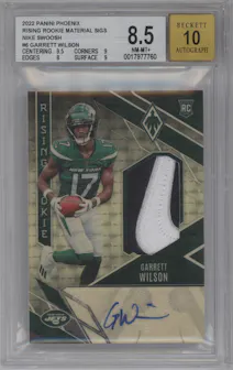 Garrett Wilson from the 2022 Panini Phoenix set featuring a Nike Swoosh parallel graded by Beckett and given an overall grade of 8.5.