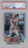 Gunnar Henderson from the 2023 Topps Chrome set featuring a Prism Refractor parallel graded by PSA and given an overall grade of 9.