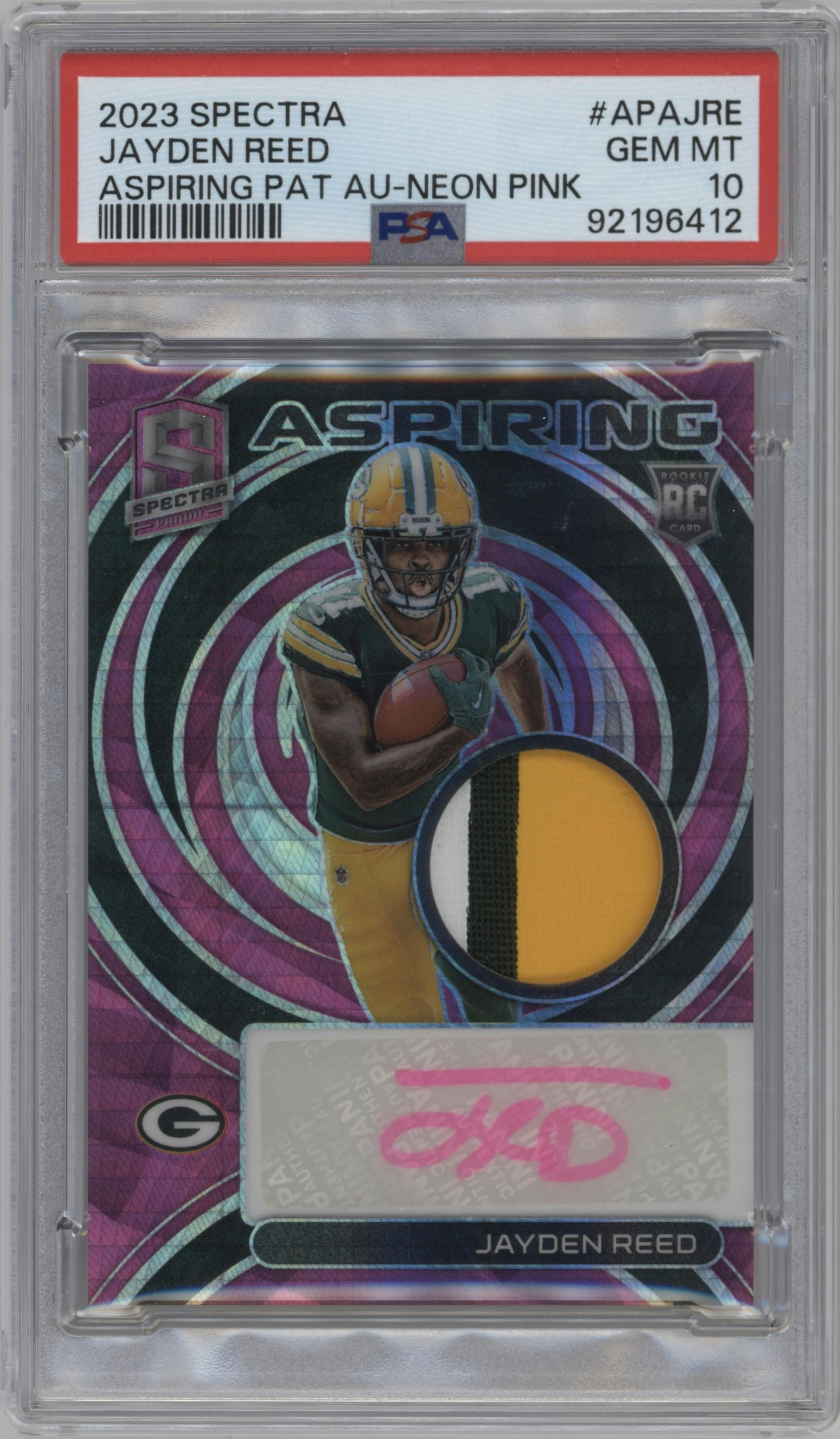 Jayden Reed from the 2023 Panini Spectra set featuring a Neon Pink parallel graded by PSA and given an overall grade of 10.