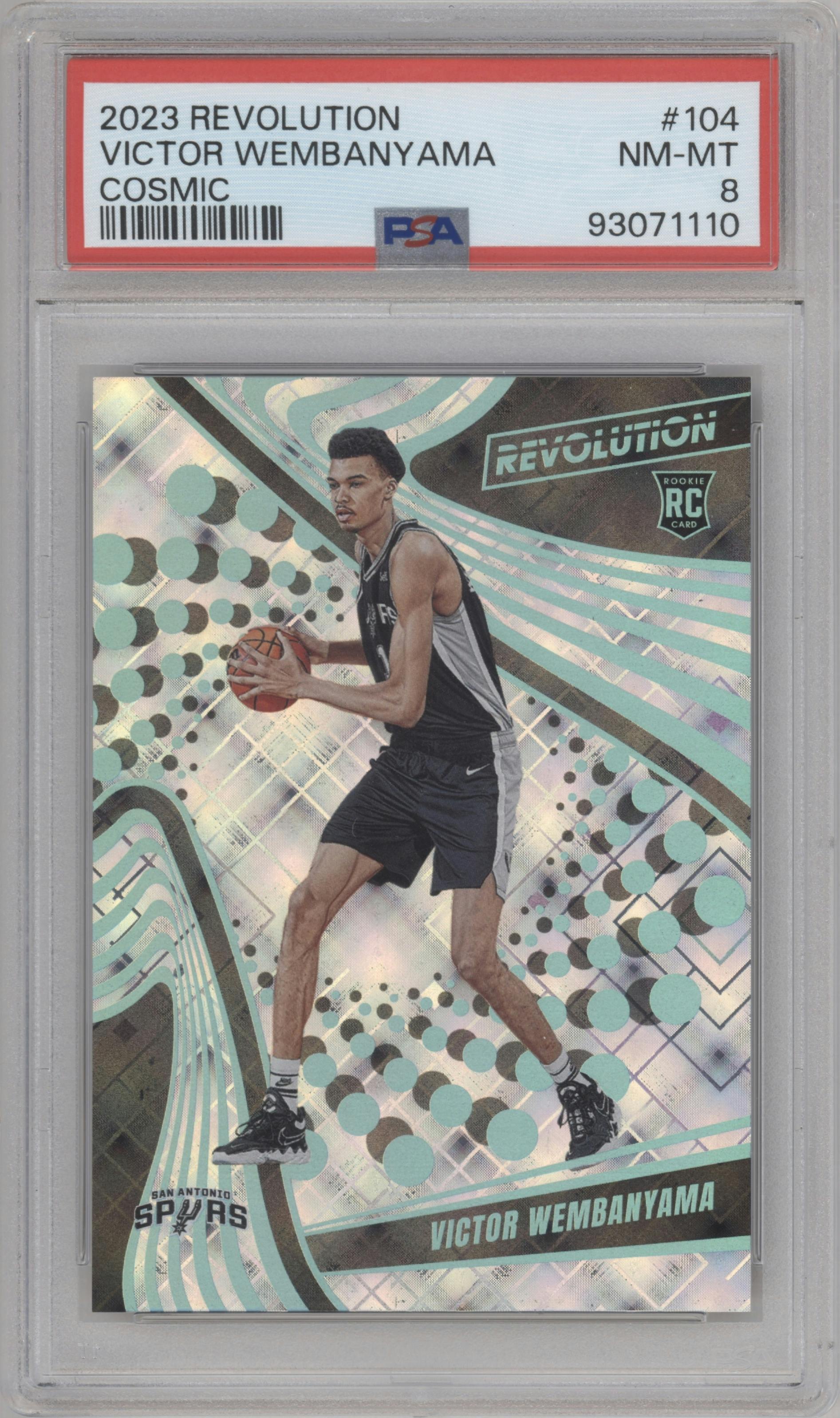 Victor Wembanyama from the 2023-24 Panini Revolution set featuring a Cosmic parallel graded by PSA and given an overall grade of 8.